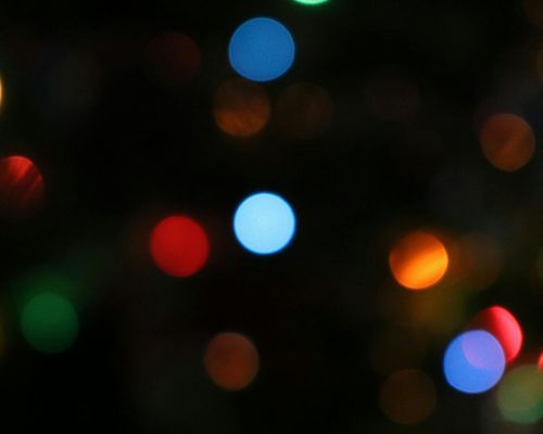 Running shoes and abstract glowing circles on floor